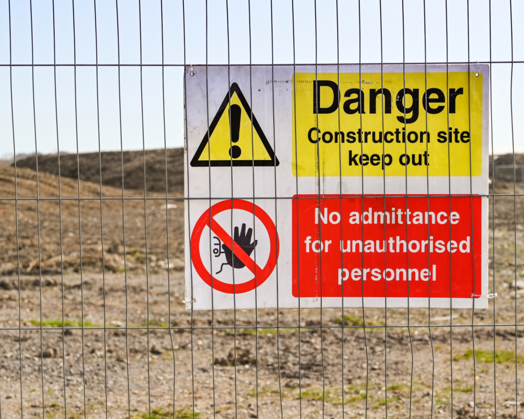 A danger sign warning to keep away in a construction site