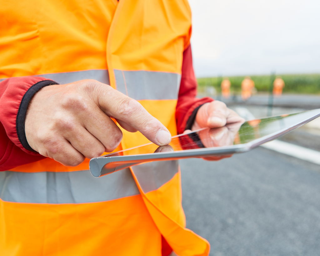 Can You Get a CSCS Card Off the Internet? : a construction worker on an electronic device