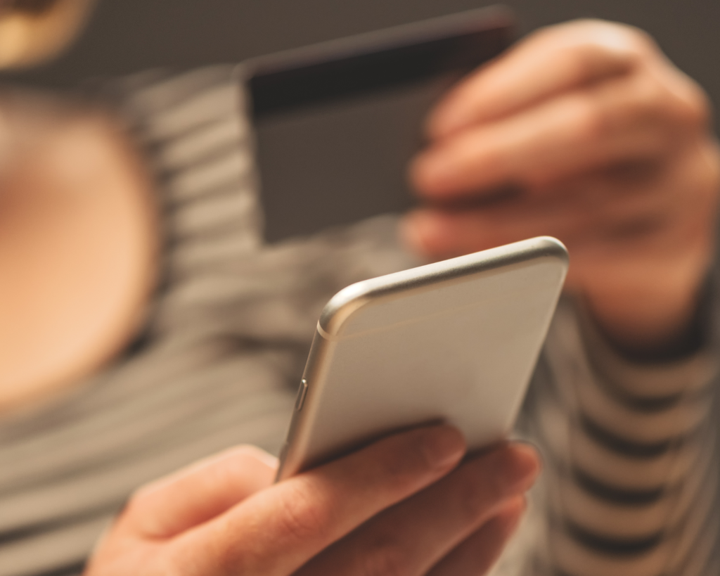 How to Check and Verify CSCS Cards Online: someone using a phone to verify a card